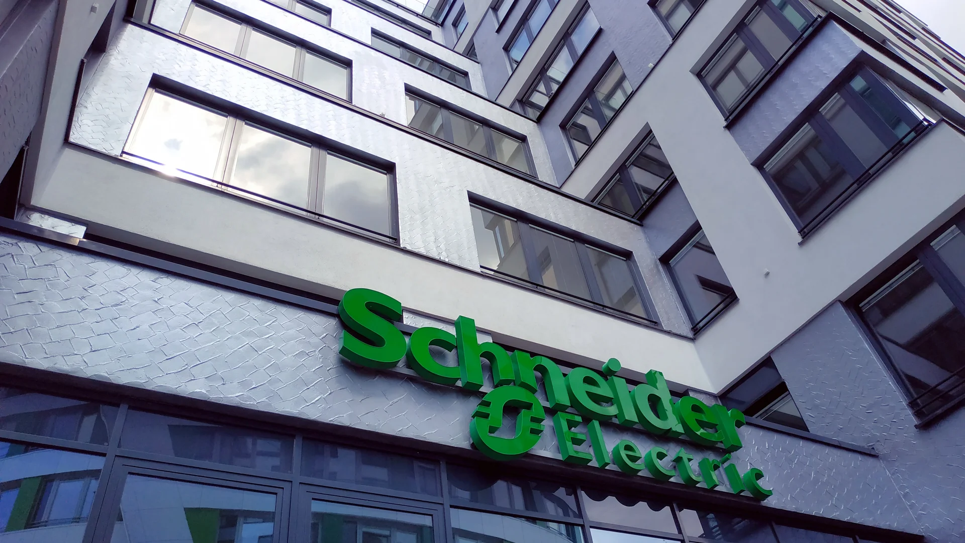 Schneider Electric signage on a building at the EUREF campus in Berlin, photographed in 2022.